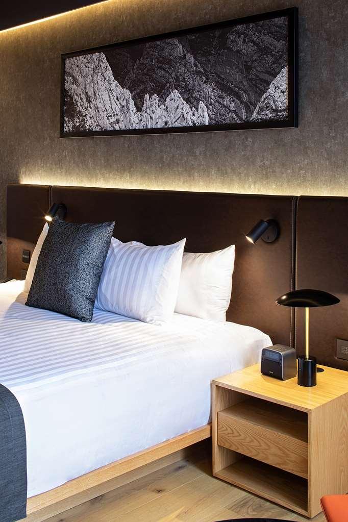 Hotel Galeria Plaza Monterrey Habitación foto A bed at the hotel